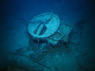 S1 stbd forward 4-inch HA Gun and mount inverted on seabed